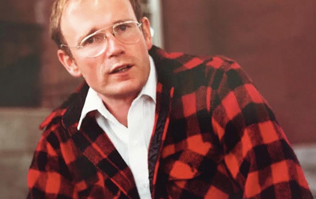 Photo of Tom Eastler &rsquo;66 in a red/black plaid coat